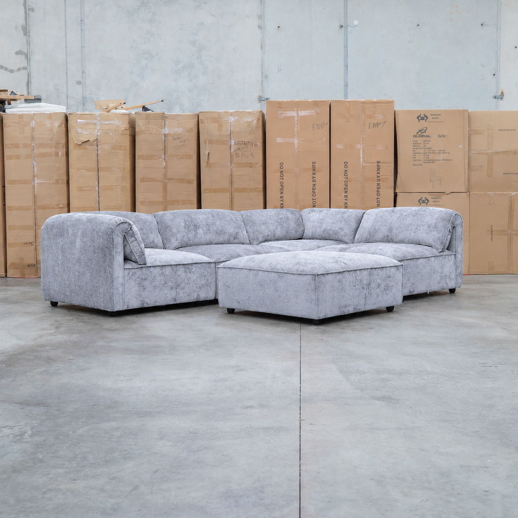 The Bellagio Deep Seat Modular Corner Lounge with Ottoman - Slate available to purchase from Warehouse Furniture Clearance at our next sale event.