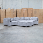 The Bellagio Deep Seat Modular Corner Lounge with Ottoman - Slate available to purchase from Warehouse Furniture Clearance at our next sale event.