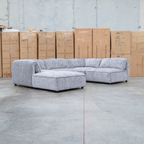 The Bellagio Deep Seat Modular Corner Lounge with Ottoman - Slate available to purchase from Warehouse Furniture Clearance at our next sale event.