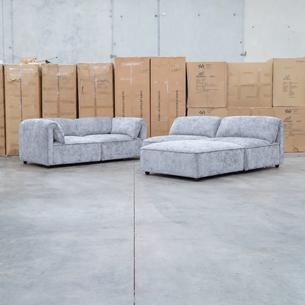 The Bellagio Deep Seat Modular Corner Lounge with Ottoman - Slate available to purchase from Warehouse Furniture Clearance at our next sale event.