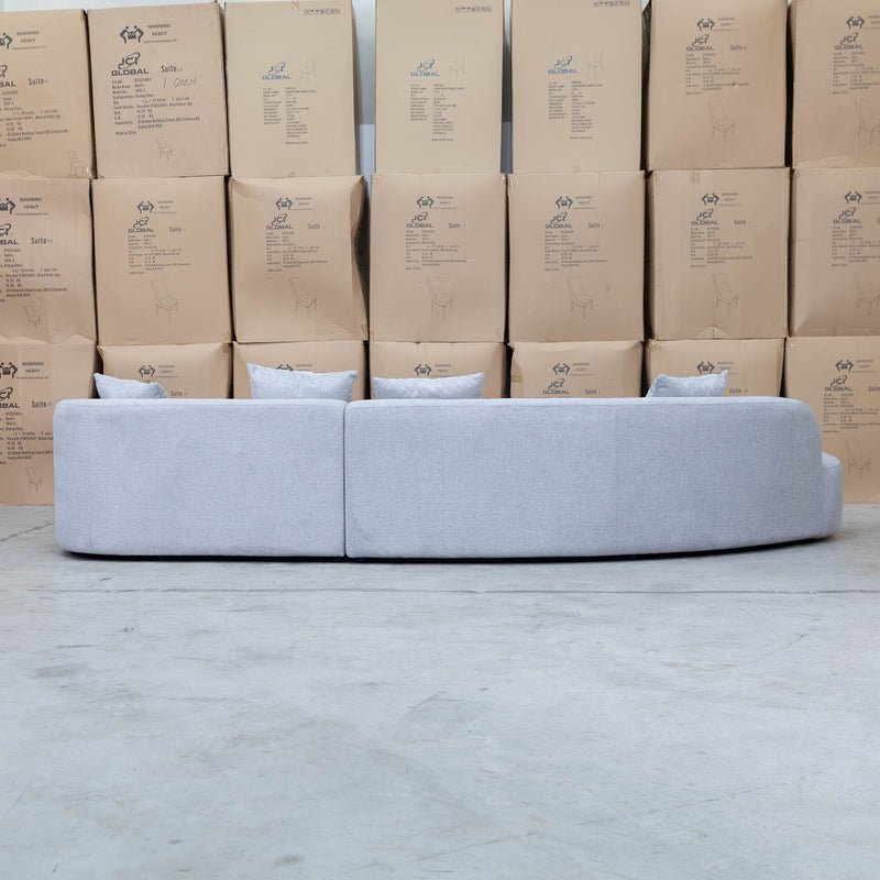 The Belview Curved Chaise Lounge - Light Grey available to purchase from Warehouse Furniture Clearance at our next sale event.