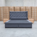 The Blake Queen Upholstered Gas Lift Storage Bed - Charcoal available to purchase from Warehouse Furniture Clearance at our next sale event.