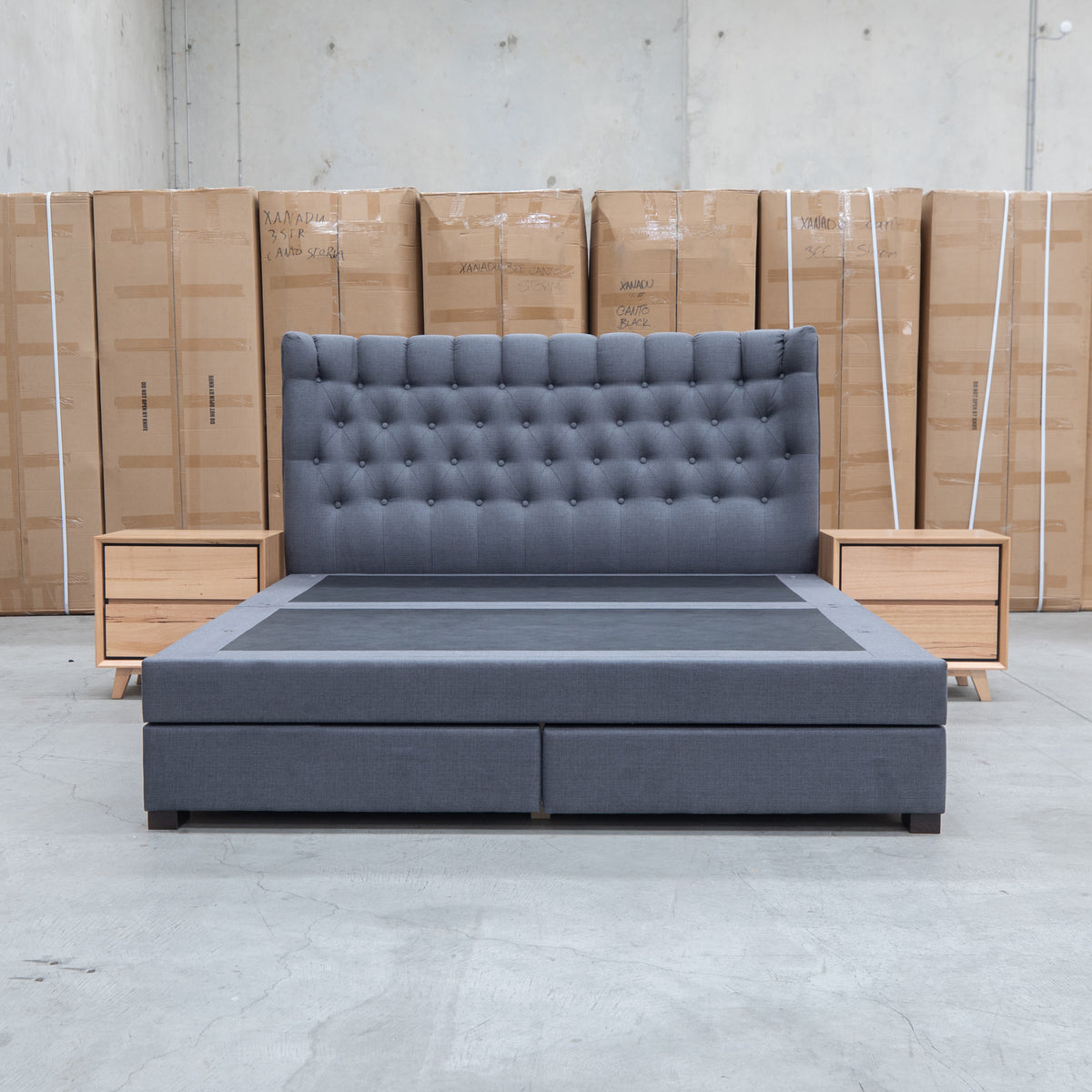 The Blake Queen Upholstered Gas Lift Storage Bed - Charcoal available to purchase from Warehouse Furniture Clearance at our next sale event.