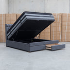 The Blake Queen Upholstered Gas Lift Storage Bed - Charcoal available to purchase from Warehouse Furniture Clearance at our next sale event.