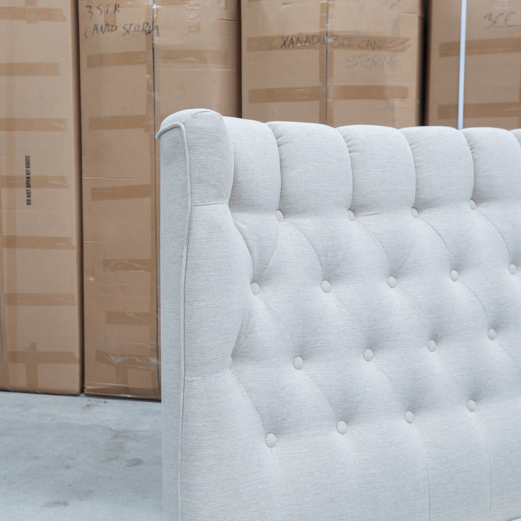 The Blake King Upholstered Gas Lift Storage Bed - Oat White available to purchase from Warehouse Furniture Clearance at our next sale event.