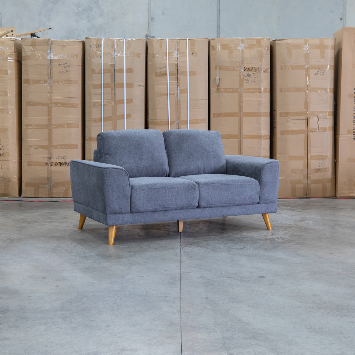 The Bristol Two Seat Fabric Sofa - Shadow available to purchase from Warehouse Furniture Clearance at our next sale event.