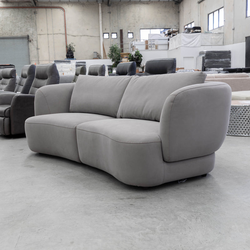 The COR-13033 2.5 seat curved sofa - Light Grey - Floor Stock available to purchase from Warehouse Furniture Clearance at our next sale event.
