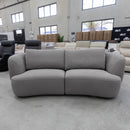 The COR-13033 2.5 seat curved sofa - Light Grey - Floor Stock available to purchase from Warehouse Furniture Clearance at our next sale event.