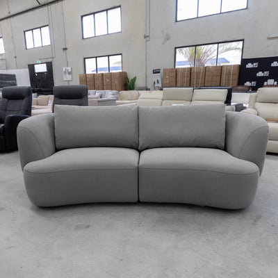 The COR-13033 2.5 seat curved sofa - Light Grey - Floor Stock available to purchase from Warehouse Furniture Clearance at our next sale event.