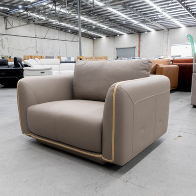 The COR-A0724 Oversized leather single chair - Pine Bark - Floor Stock available to purchase from Warehouse Furniture Clearance at our next sale event.