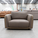 The COR-A0724 Oversized leather single chair - Pine Bark - Floor Stock available to purchase from Warehouse Furniture Clearance at our next sale event.