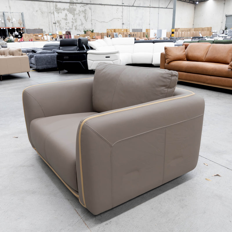 The COR-A0724 Oversized leather single chair - Pine Bark - Floor Stock available to purchase from Warehouse Furniture Clearance at our next sale event.