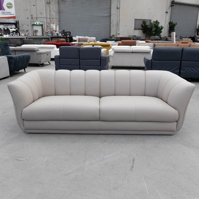 The COR-A0725 3 seat leather sofa - Oatmeal - Floor Stock available to purchase from Warehouse Furniture Clearance at our next sale event.
