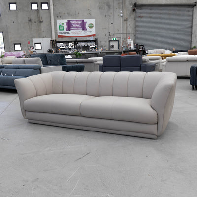 The COR-A0725 3 seat leather sofa - Oatmeal - Floor Stock available to purchase from Warehouse Furniture Clearance at our next sale event.