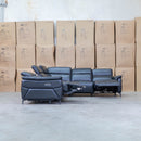 The Cali Electric Leather Corner Recliner Lounge - Black available to purchase from Warehouse Furniture Clearance at our next sale event.