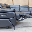 The Cali Electric Leather Corner Recliner Lounge - Black available to purchase from Warehouse Furniture Clearance at our next sale event.