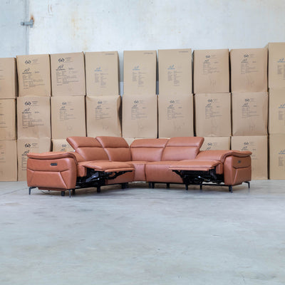 The Cali Electric Leather Corner Recliner Lounge - Cognac available to purchase from Warehouse Furniture Clearance at our next sale event.