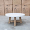 The Casper Round White Concrete & Acacia Timber Coffee Table available to purchase from Warehouse Furniture Clearance at our next sale event.