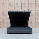 The Chester King Fabric Gas Lift Storage Bed - Charcoal available to purchase from Warehouse Furniture Clearance at our next sale event.