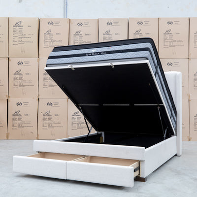 The Chester King Fabric Gas Lift Storage Bed - Oat White available to purchase from Warehouse Furniture Clearance at our next sale event.