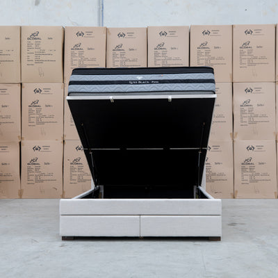 The Chester King Fabric Gas Lift Storage Bed - Oat White available to purchase from Warehouse Furniture Clearance at our next sale event.