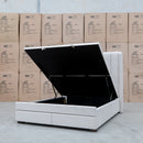 The Chester King Fabric Gas Lift Storage Bed - Oat White available to purchase from Warehouse Furniture Clearance at our next sale event.