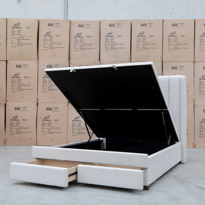 The Chester King Fabric Gas Lift Storage Bed - Oat White available to purchase from Warehouse Furniture Clearance at our next sale event.
