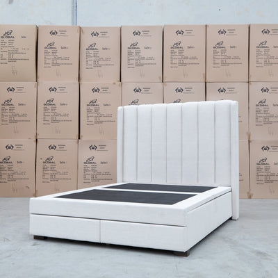 The Chester King Fabric Gas Lift Storage Bed - Oat White available to purchase from Warehouse Furniture Clearance at our next sale event.