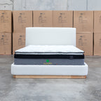 The Clara King Upholstered Bed with Solid Timber Plinth - Cream available to purchase from Warehouse Furniture Clearance at our next sale event.