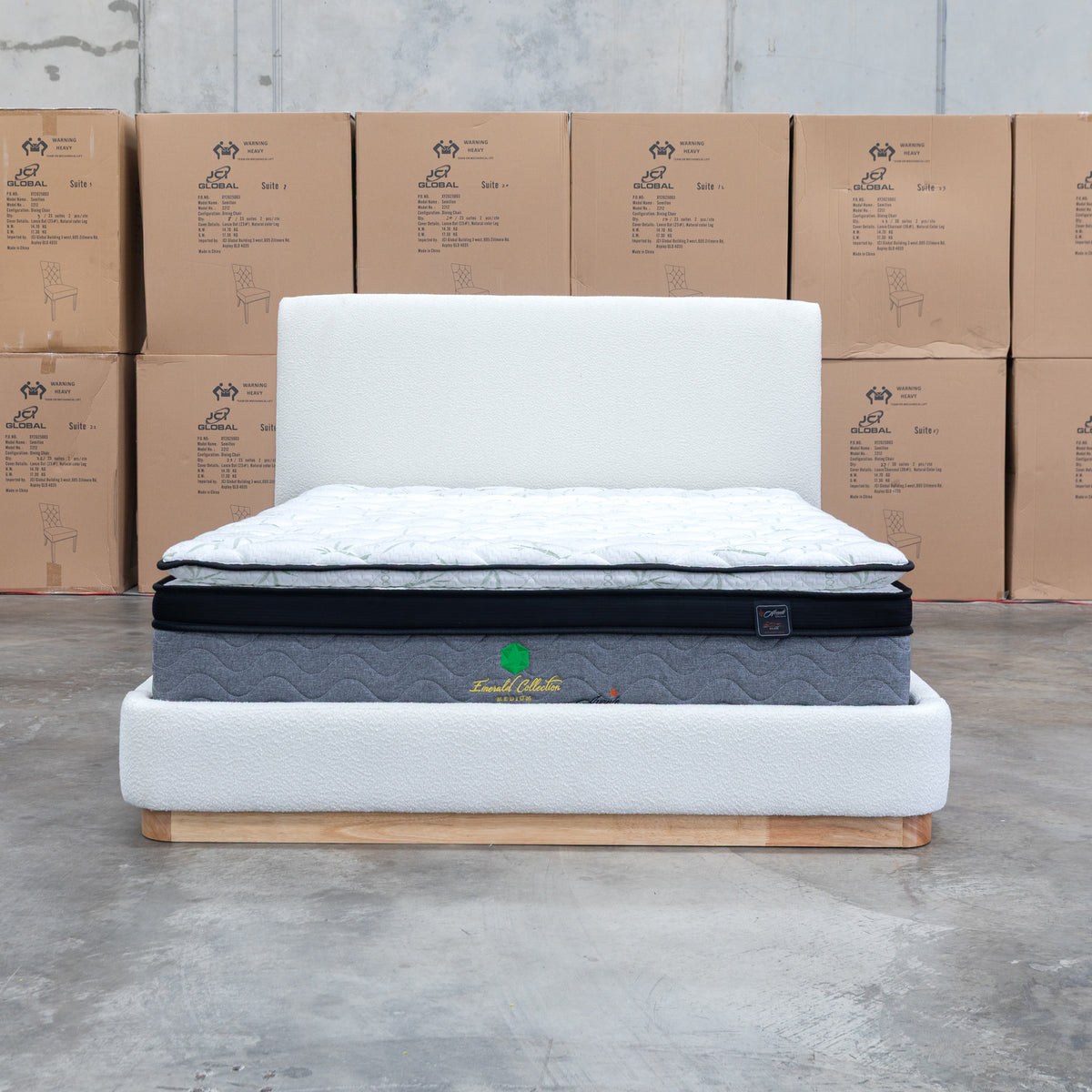 The Clara King Upholstered Bed with Solid Timber Plinth - Cream available to purchase from Warehouse Furniture Clearance at our next sale event.