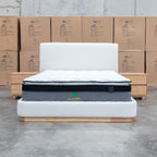 The Clara King Upholstered Bed with Solid Timber Plinth - Cream available to purchase from Warehouse Furniture Clearance at our next sale event.