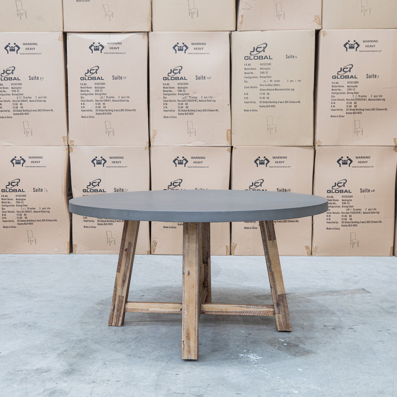 The Cleo 150cm Round Dark Concrete Dining Table available to purchase from Warehouse Furniture Clearance at our next sale event.