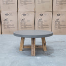 The Cleo Round Dark Concrete & Acacia Timber Coffee Table available to purchase from Warehouse Furniture Clearance at our next sale event.