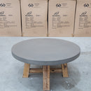 The Cleo Round Dark Concrete & Acacia Timber Coffee Table available to purchase from Warehouse Furniture Clearance at our next sale event.