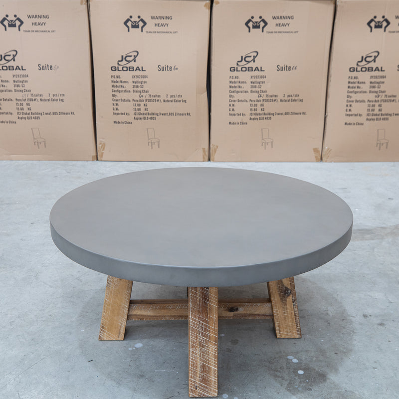 The Cleo Round Dark Concrete & Acacia Timber Coffee Table available to purchase from Warehouse Furniture Clearance at our next sale event.