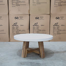 The Cleo Round White Concrete & Acacia Timber Coffee Table available to purchase from Warehouse Furniture Clearance at our next sale event.