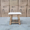 The Cleo White Concrete & Acacia Timber Lamp Table available to purchase from Warehouse Furniture Clearance at our next sale event.