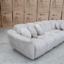 The Cloud Plush Fabric Corner Lounge - Oat - Available After 13th May available to purchase from Warehouse Furniture Clearance at our next sale event.