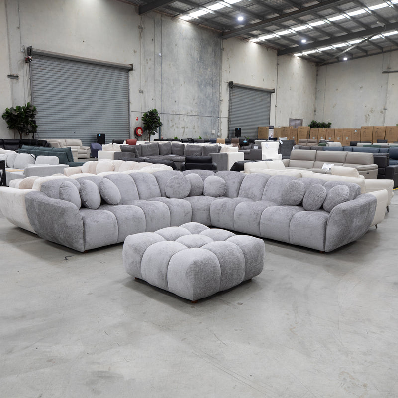 The Cloud Plush Fabric Ottoman - Slate - Available After 13th May available to purchase from Warehouse Furniture Clearance at our next sale event.