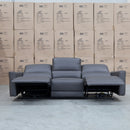 The Cobble Electric Three Seat Leather Recliner Lounge - Storm available to purchase from Warehouse Furniture Clearance at our next sale event.