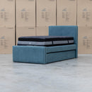 The Coco Single Fabric Trundle Bed - Teal (Reversible Trundle) available to purchase from Warehouse Furniture Clearance at our next sale event.