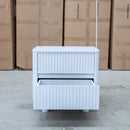 The Cooper Two Drawer White Ash Bedside - White available to purchase from Warehouse Furniture Clearance at our next sale event.