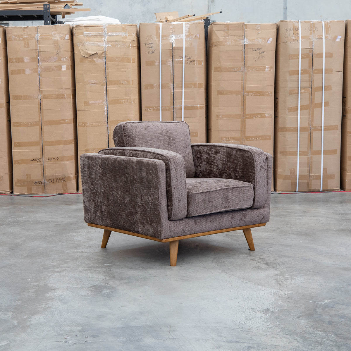The Delilah Armchair - Chocolate available to purchase from Warehouse Furniture Clearance at our next sale event.