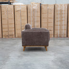 The Delilah Armchair - Chocolate available to purchase from Warehouse Furniture Clearance at our next sale event.