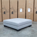 The Delta Oversized Ottoman - Silver available to purchase from Warehouse Furniture Clearance at our next sale event.