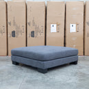 The Delta Oversized Ottoman - Graphite available to purchase from Warehouse Furniture Clearance at our next sale event.