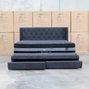 The Denmark Queen Fabric Storage Bed - Charcoal available to purchase from Warehouse Furniture Clearance at our next sale event.