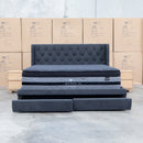 The Denmark Queen Fabric Storage Bed - Charcoal available to purchase from Warehouse Furniture Clearance at our next sale event.