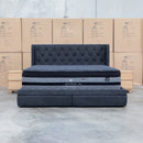 The Denmark Queen Fabric Storage Bed - Charcoal available to purchase from Warehouse Furniture Clearance at our next sale event.