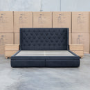 The Denmark Queen Fabric Storage Bed - Charcoal available to purchase from Warehouse Furniture Clearance at our next sale event.